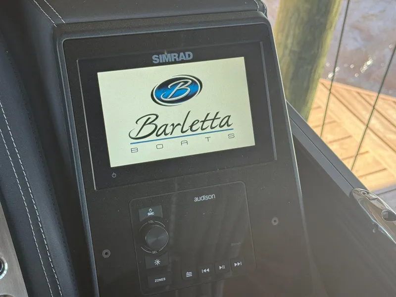 Slide: The Image of Simrad display on 2022 Barletta Lusso 23U boat dashboard. - 20