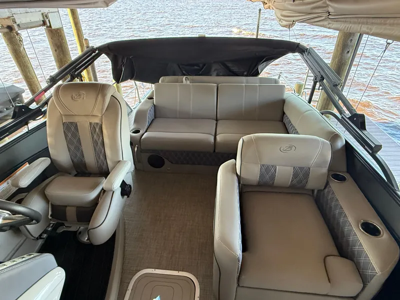 Slide: The Image of 2022 Barletta Lusso 23U boat interior with luxurious seating and elegant design. - 24