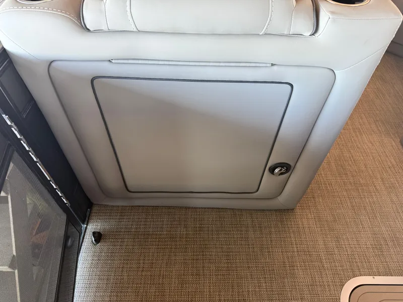 Slide: The Image of 2022 Barletta Lusso 23U interior detail with beige upholstery and carpet flooring. - 27