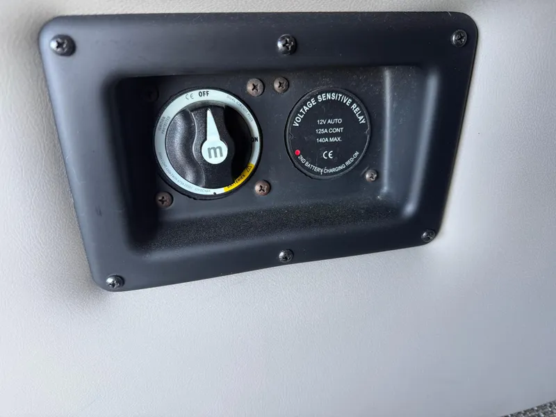 Slide: The Image of Control panel on a 2022 Barletta Lusso 23U boat, featuring a voltage sensitive relay. - 30