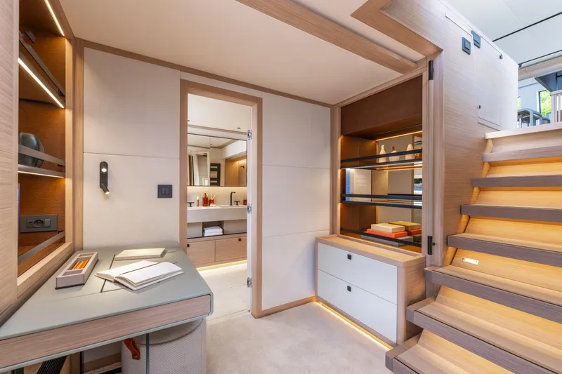 Slide: The Image of Luxurious 2025 Lagoon Eighty 2 yacht bedroom with elegant decor and ocean view. - 28