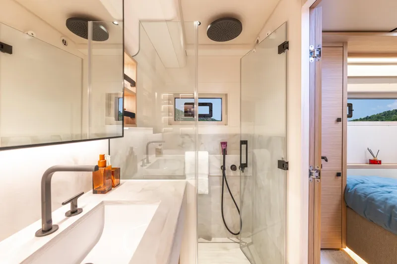 Slide: The Image of Modern bathroom in 2025 Lagoon Eighty 2 yacht with sleek design and glass shower. - 43