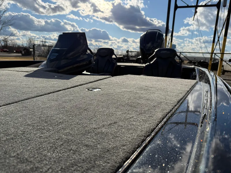 Slide: The Image of 2025 Skeeter ZXR20 boat deck under a cloudy sky. - 8