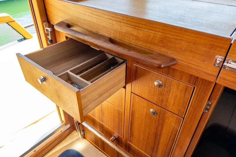 Slide: The Image of Wooden interior drawer in 2025 Targa 37 boat, showcasing elegant craftsmanship and storage. - 19