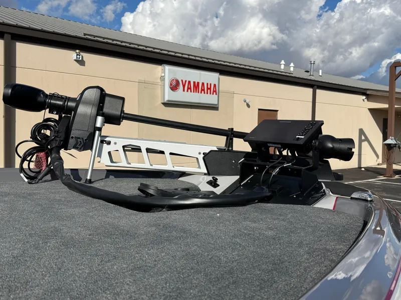 Slide: The Image of 2025 Skeeter ZXR21 boat with Yamaha equipment, under a cloudy sky. - 10