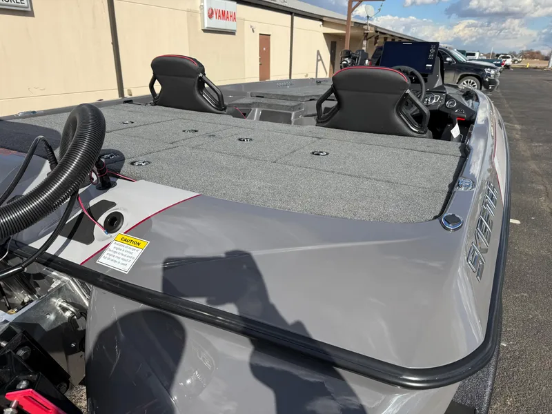 Slide: The Image of 2025 Skeeter ZXR21 boat with dual seats and sleek design. - 15