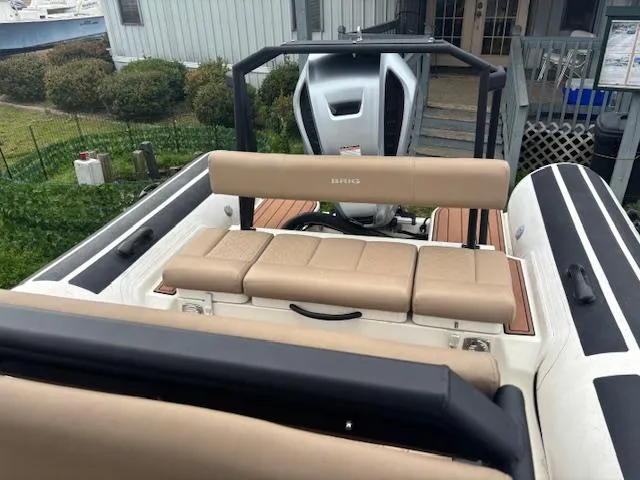 Slide: The Image of 2022 Brig Navigator 24 boat with beige seating and modern design. - 15