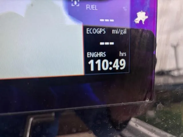 Slide: The Image of Display screen showing engine hours at 110:49 on a 2022 Brig Navigator 24. - 20