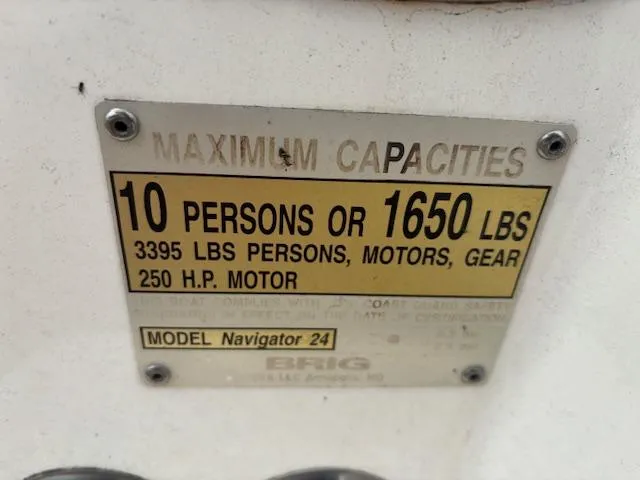 Slide: The Image of Brig Navigator 24 capacity plate: 10 persons, 1650 lbs, 250 HP motor, 2022 model. - 22