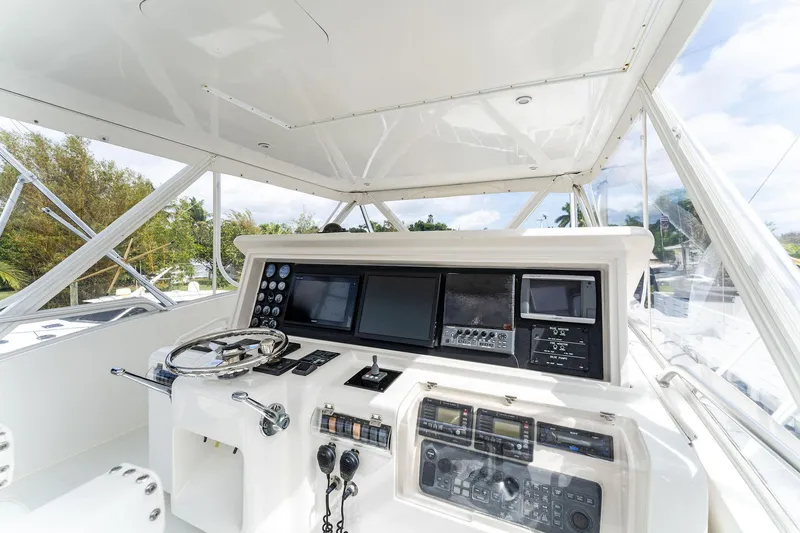 Slide: The Image of 2003 Bertram 570 Moppie helm with modern navigation equipment and controls. - 15