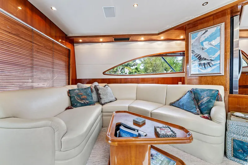 Slide: The Image of Luxurious interior of 2003 Bertram 570 Moppie yacht with elegant seating and decor. - 23