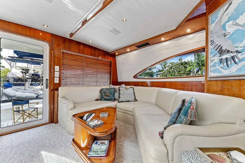 Slide: The Image of Luxurious interior of 2003 Bertram 570 Moppie yacht with elegant seating and decor. - 24
