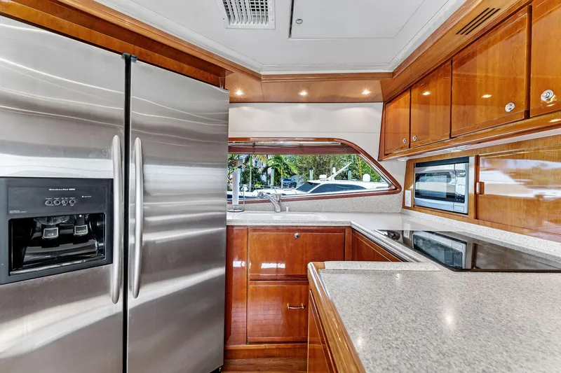 Slide: The Image of Luxurious kitchen interior of 2003 Bertram 570 Moppie yacht with stainless steel appliances. - 32