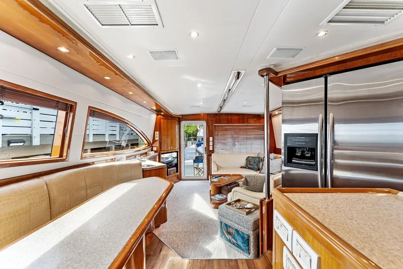 Slide: The Image of Luxurious interior of 2003 Bertram 570 Moppie yacht with modern amenities and elegant design. - 34
