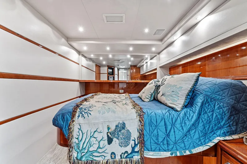 Slide: The Image of Luxurious cabin interior of 2003 Bertram 570 Moppie yacht with elegant bedding. - 48