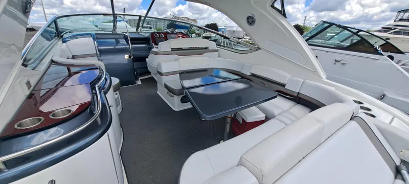 Slide: The Image of 2018 Formula 400 Super Sport yacht interior with luxurious seating and sleek design. - 16