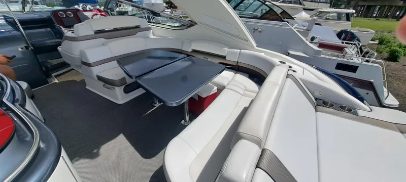 Slide: The Image of 2018 Formula 400 Super Sport boat interior with luxurious seating and table. - 17