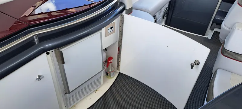 Slide: The Image of 2018 Formula 400 Super Sport interior with open storage compartment and seating. - 28