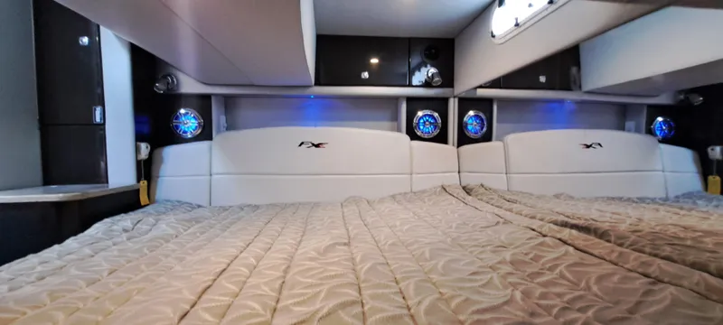 Slide: The Image of Interior cabin of 2018 Formula 400 Super Sport with modern bedding and ambient lighting. - 37