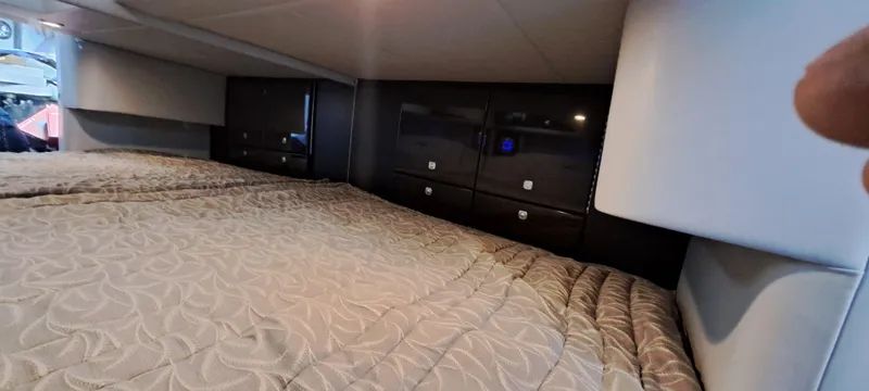 Slide: The Image of Interior cabin of 2018 Formula 400 Super Sport with bed and storage cabinets. - 39