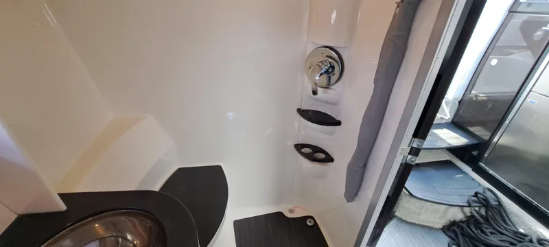 Slide: The Image of 2018 Formula 400 Super Sport bathroom interior with modern fixtures and sleek design. - 42