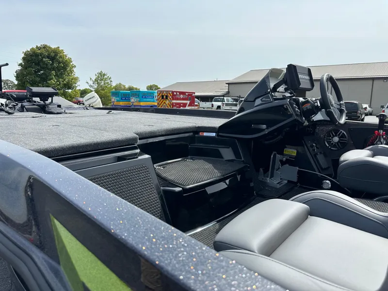 Slide: The Image of 2025 iKon VLX20 boat interior with modern dashboard and seating. - 11