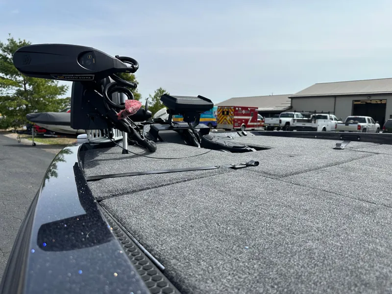 Slide: The Image of 2025 iKon VLX20 boat deck with mounted equipment in a parking area. - 14