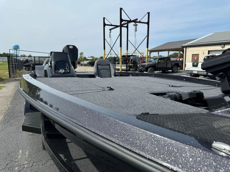 Slide: The Image of iKon VLX20 2025 boat with sleek design, parked outdoors on a sunny day. - 17