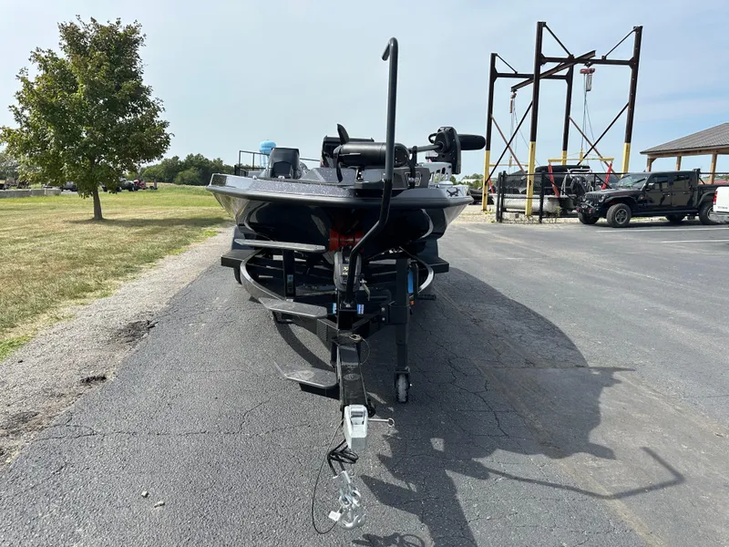 Slide: The Image of 2025 iKon VLX20 boat on trailer in parking lot. - 3