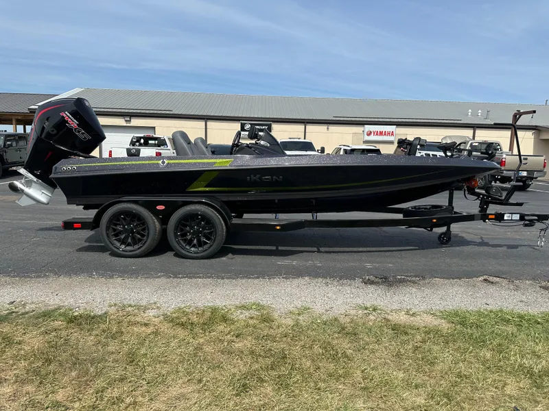 Slide: The Image of 2025 iKon VLX20 boat on trailer, parked outdoors near a building. - 5