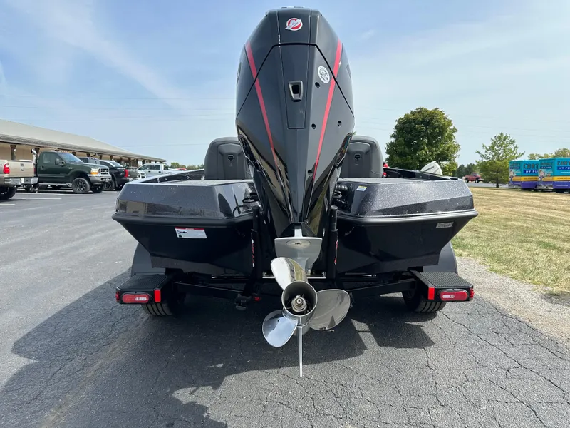 Slide: The Image of Rear view of 2025 iKon VLX20 boat with powerful outboard motor. - 8