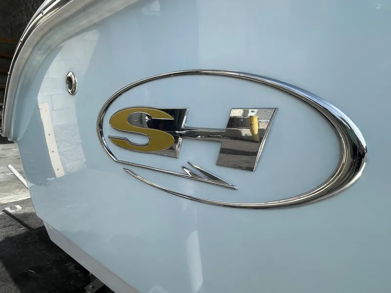 Slide: The Image of Sea Hunt Ultra 219 boat logo, 2021 model, with metallic finish. - 16