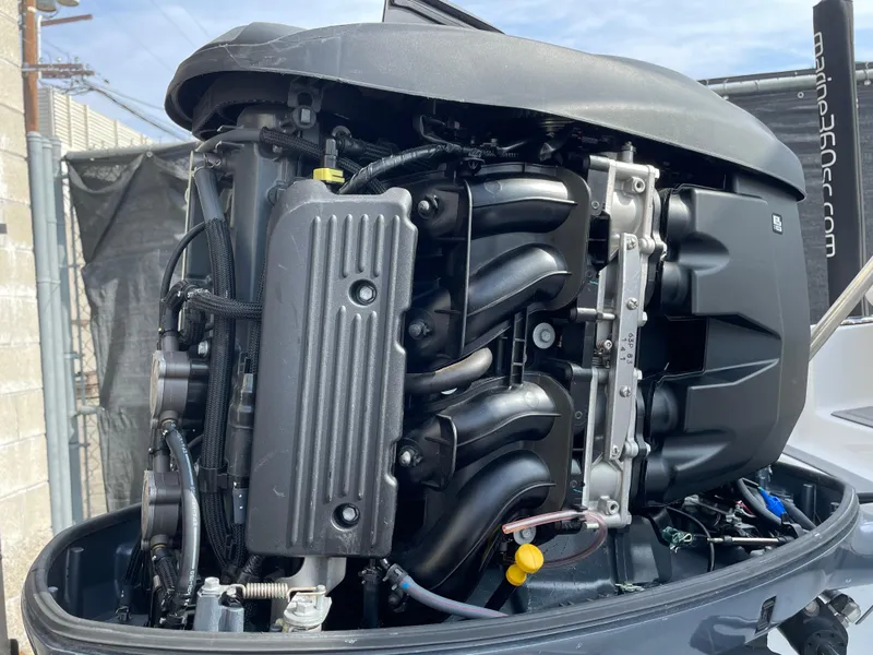 Slide: The Image of 2021 Sea Hunt Ultra 219 boat engine, detailed view of internal components. - 24
