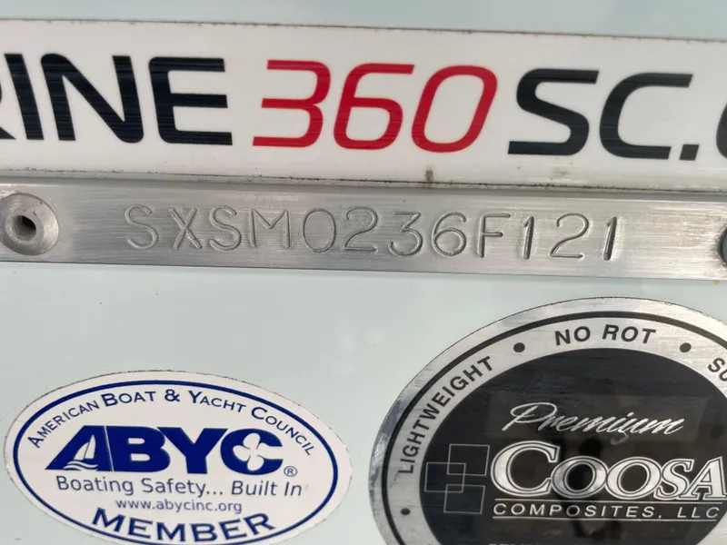 Slide: The Image of 2021 Sea Hunt Ultra 219 boat with ABYC and Coosa Composites stickers. - 28