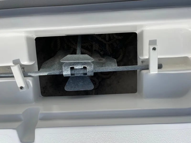 Slide: The Image of Anchor storage compartment on a 2021 Sea Hunt Ultra 219 boat. - 31