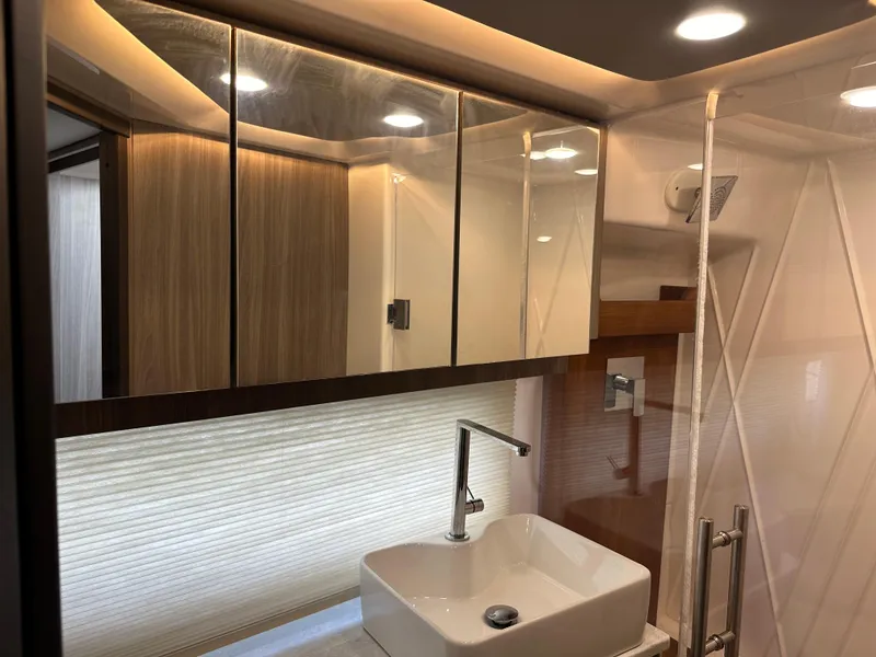 Slide: The Image of Luxurious bathroom interior of 2021 Regal 42 FXO yacht with modern fixtures and lighting. - 38