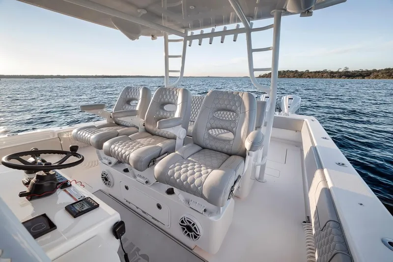 Slide: The Image of 2021 Contender 44 ST boat interior with luxurious seating on open water. - 20