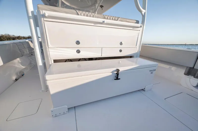 Slide: The Image of 2021 Contender 44 ST boat interior with storage compartments and seating. - 36