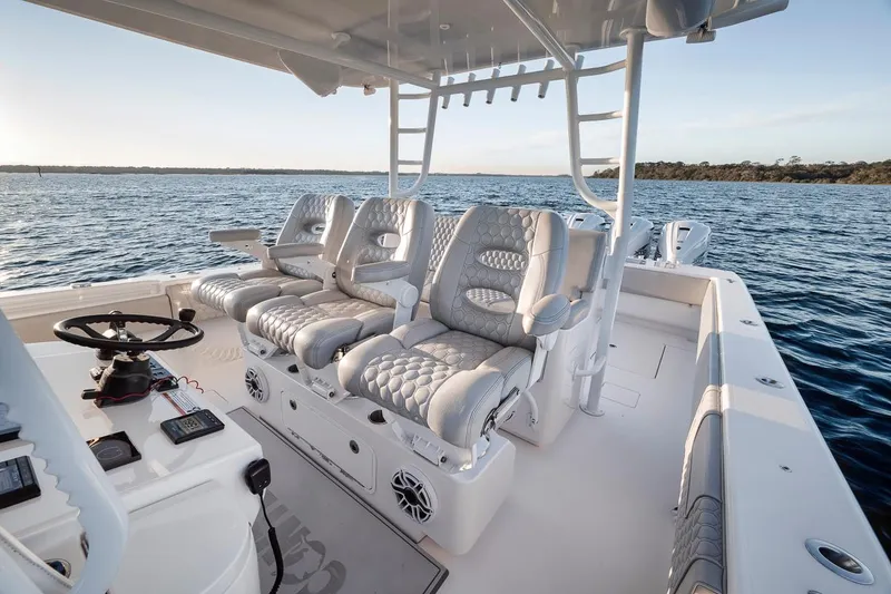 Slide: The Image of 2021 Contender 44 ST boat interior with luxurious seating on open water. - 41