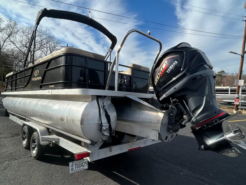 Slide: The Image of 2022 Veranda Relax VR25RC pontoon boat on trailer with Yamaha outboard motor. - 14