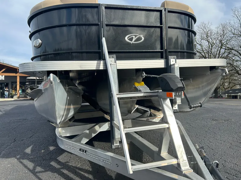 Slide: The Image of 2022 Veranda Relax VR25RC pontoon boat on trailer, featuring sleek black design. - 3