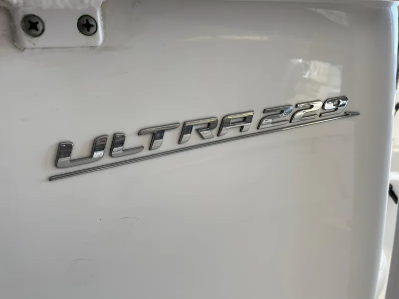 Slide: The Image of 2023 Sea Hunt Ultra 229 logo on white surface. - 17