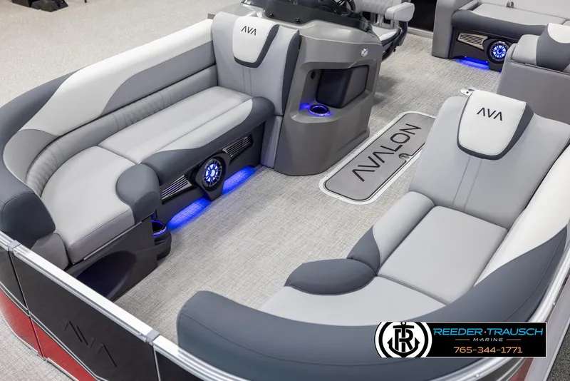 Slide: The Image of 2025 Avalon LSZ VRB boat interior with gray seating and blue LED lighting. - 10
