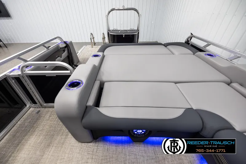 Slide: The Image of 2025 Avalon LSZ VRB pontoon boat interior with luxurious seating and LED lighting. - 15