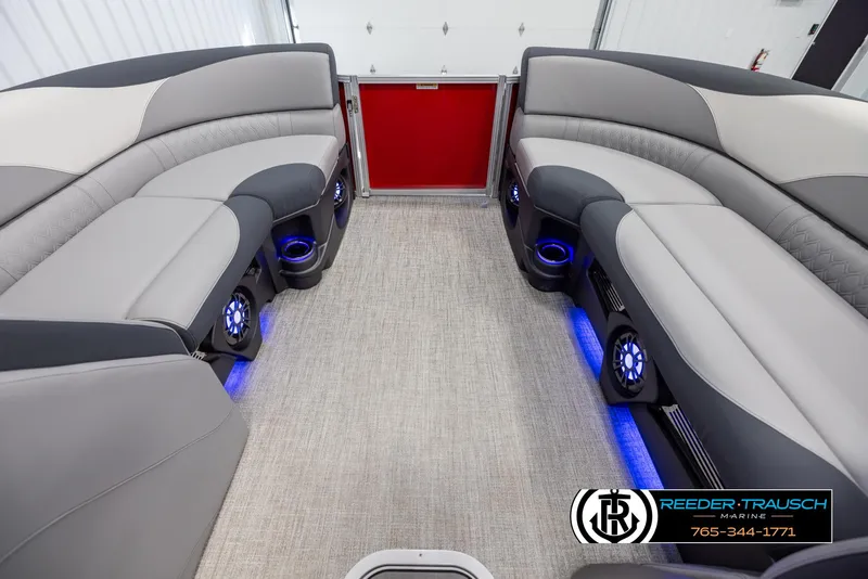 Slide: The Image of Luxurious 2025 Avalon LSZ VRB boat interior with LED lighting and plush seating. - 18