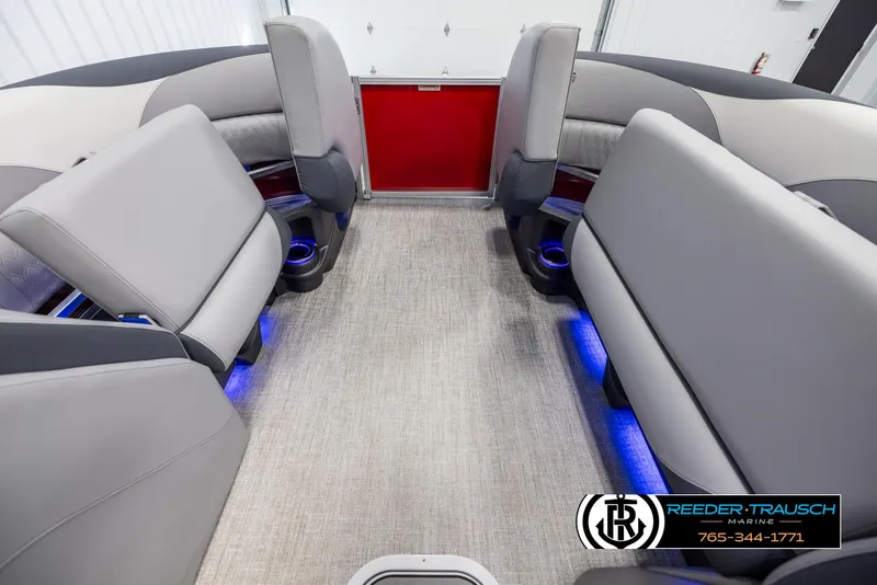 Slide: The Image of Interior of 2025 Avalon LSZ VRB boat with modern seating and blue LED lighting. - 19