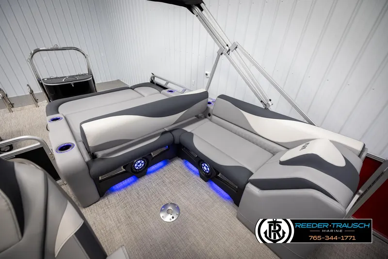 Slide: The Image of Luxurious interior of 2025 Avalon LSZ VRB pontoon boat with LED lighting and plush seating. - 24