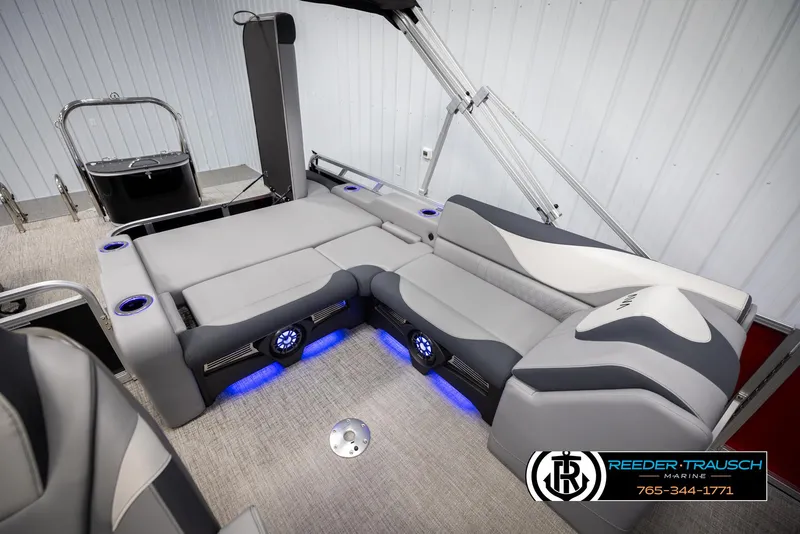 Slide: The Image of 2025 Avalon LSZ VRB boat interior with modern seating and blue LED lighting. - 27