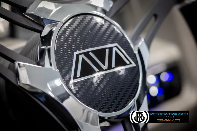 Slide: The Image of 2025 Avalon LSZ VRB logo with carbon fiber design and chrome accents. - 32