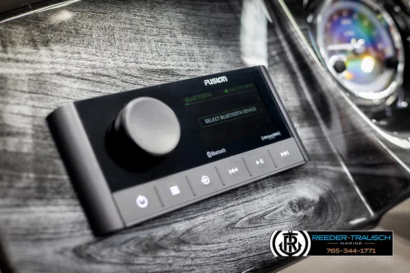 Slide: The Image of 2025 Avalon LSZ VRB dashboard with Fusion audio system and Bluetooth connectivity. - 34